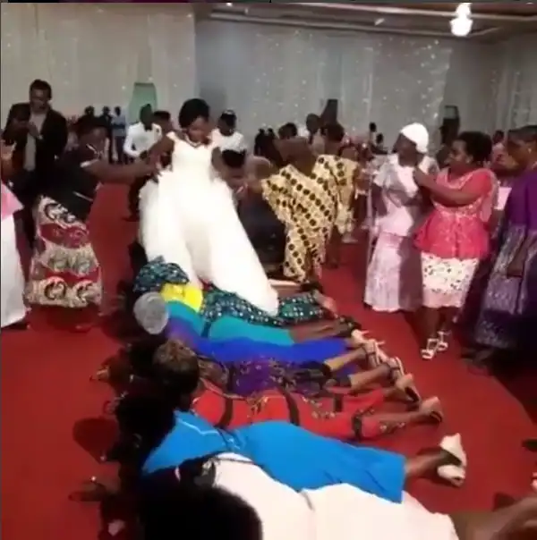 Newlywed Couple Made To Climb On Guests At Their Wedding Ceremony. Photos